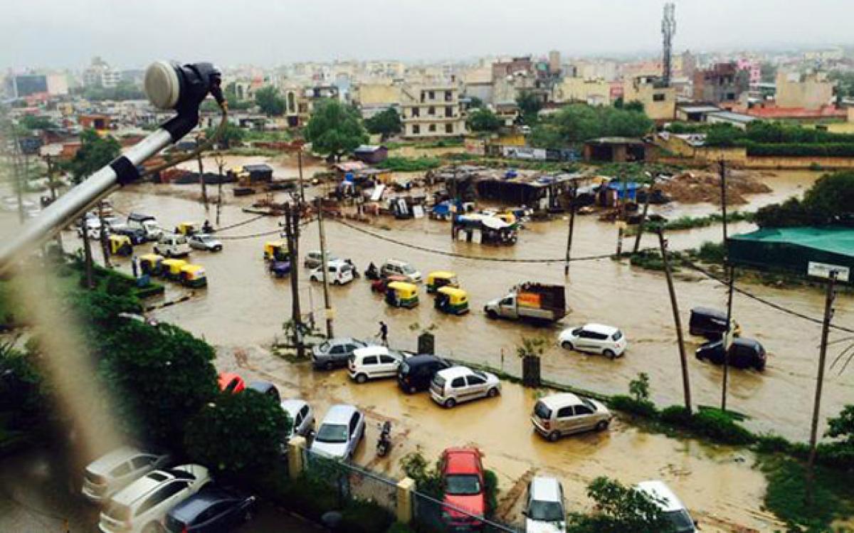 Delhi traffic chokes after heavy rains bring life to a standstill